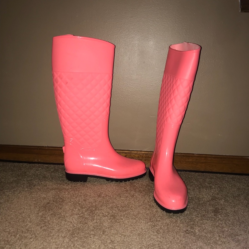 Pink rain boots